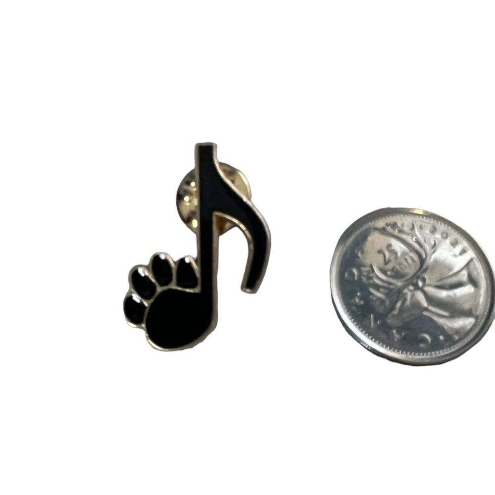 COPY - 🆕 A musical note pin with a paw print on it. 🐾 🎶